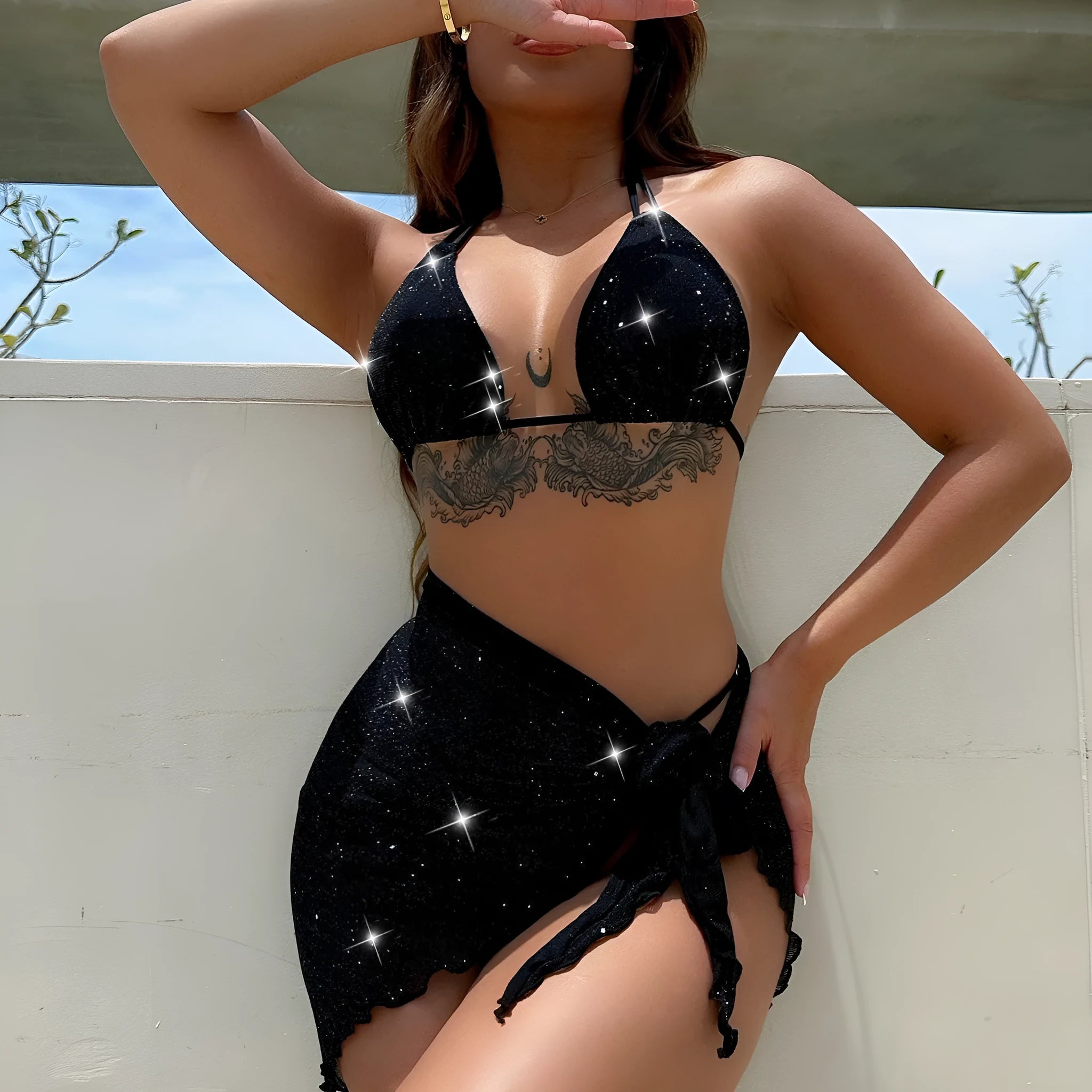 Black three-piece bikini swimsuit set with polyester fabric, showing top and shorts components