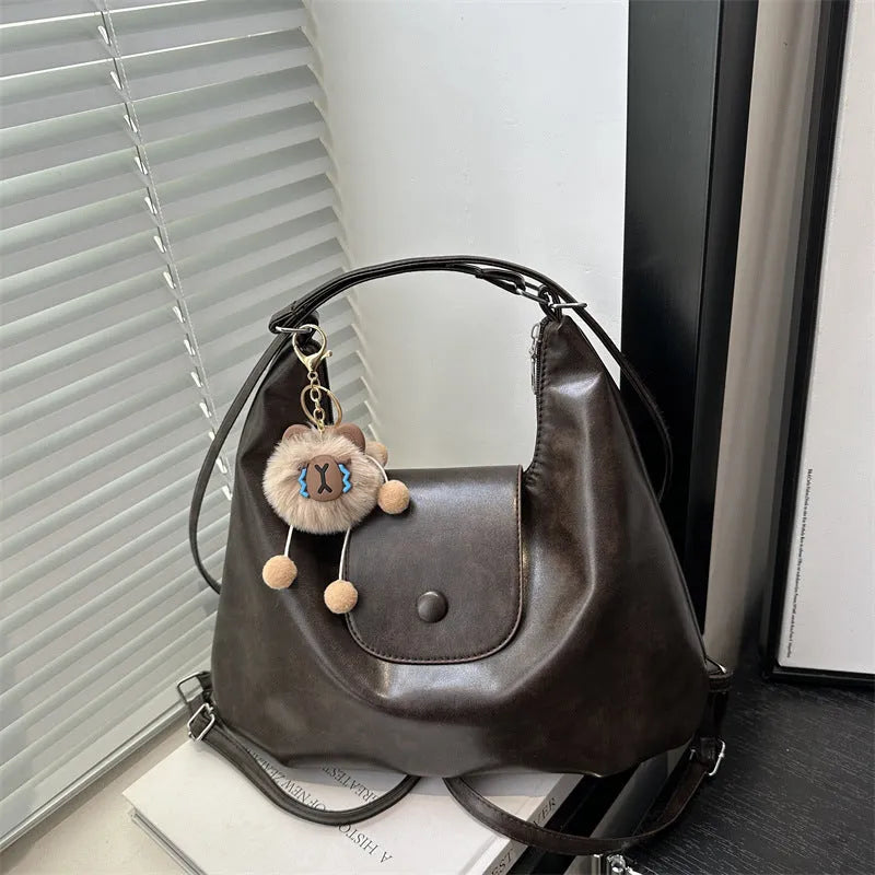 Women's textured PU leather commuter shoulder bag with horizontal design and single strap
