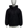 Grey women's loose-fit hooded polyester shell jacket with long sleeves on a hanger.