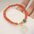 Natural red agate bracelet with cat paw design and jade accent stones
