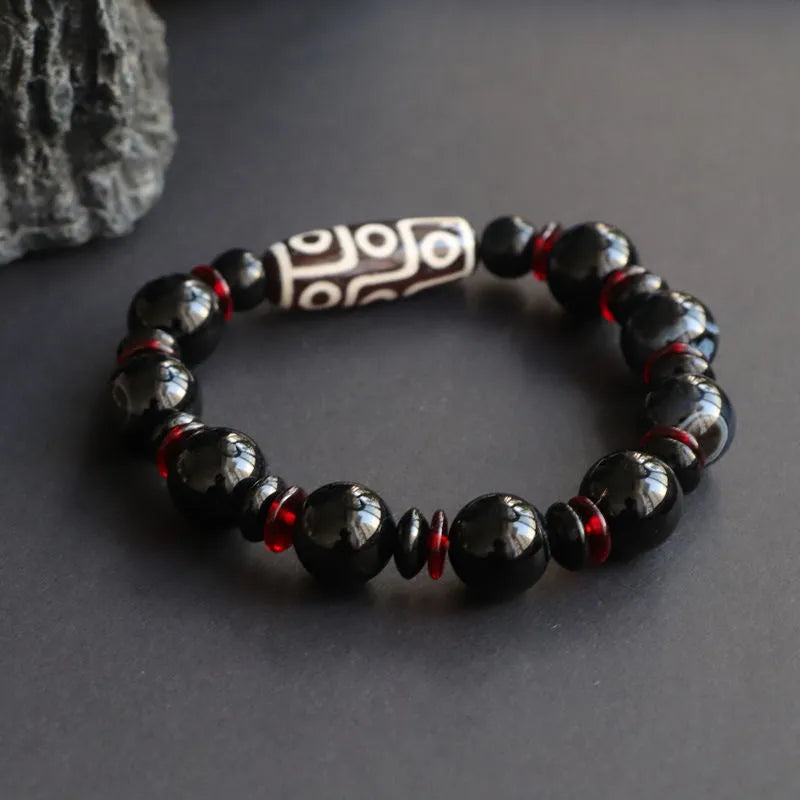 Hand-woven black agate and chalcedony dzi bead bracelet with 11mm geometry beads