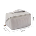 Vertical pattern pillow makeup bag in PU material measuring 22.5cm cubic for travel storage
