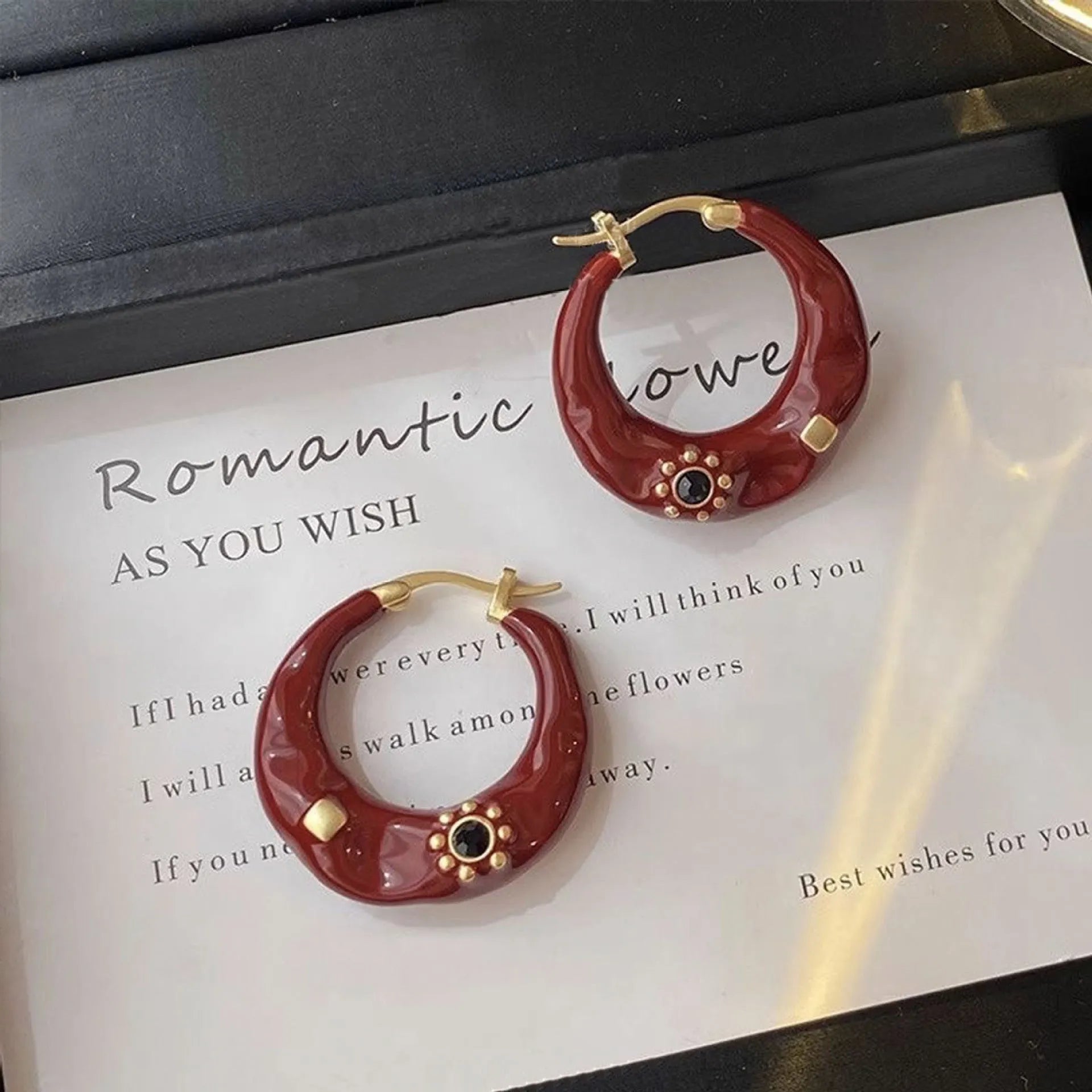 Hong Kong style retro ear studs with rhinestone inlay in black and red colour options