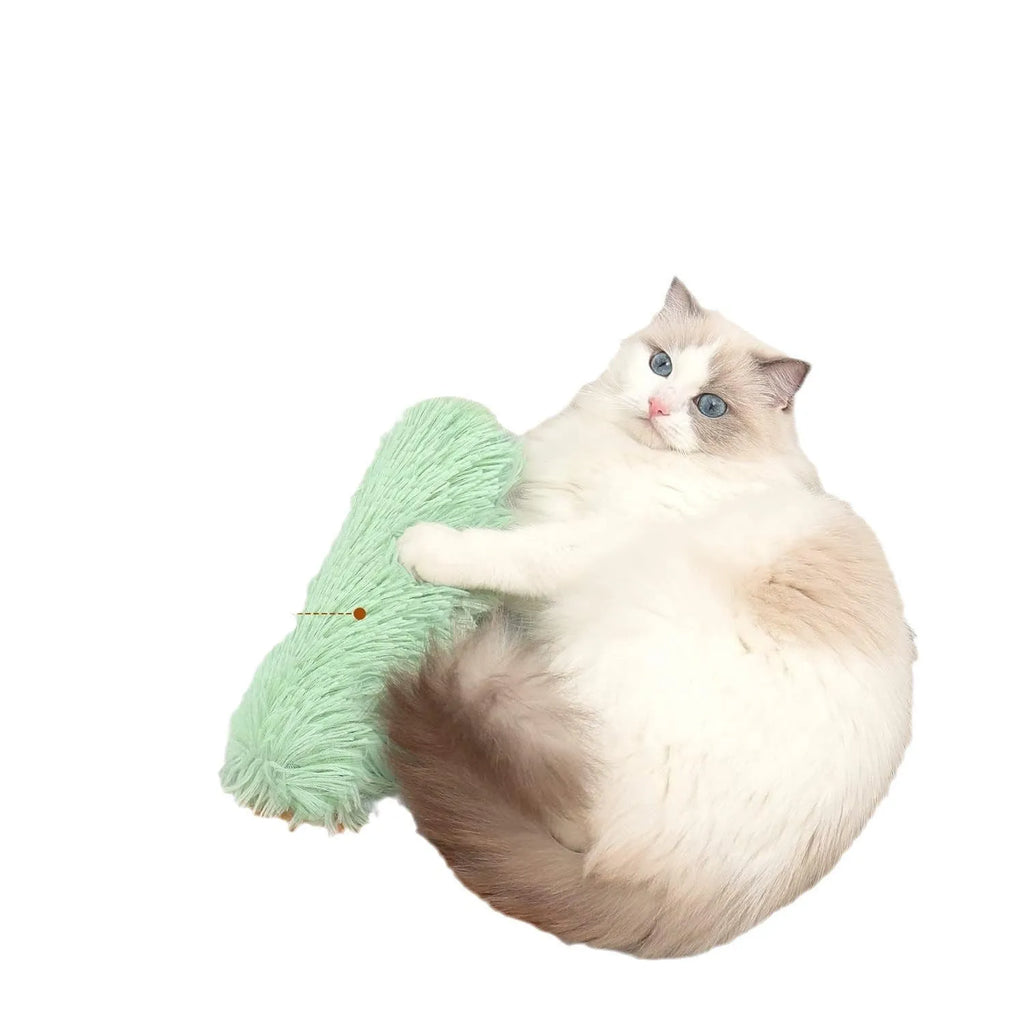 Plush cat toy pillow in blue, green, pink, and white colours, shown at 27cm by 10cm size