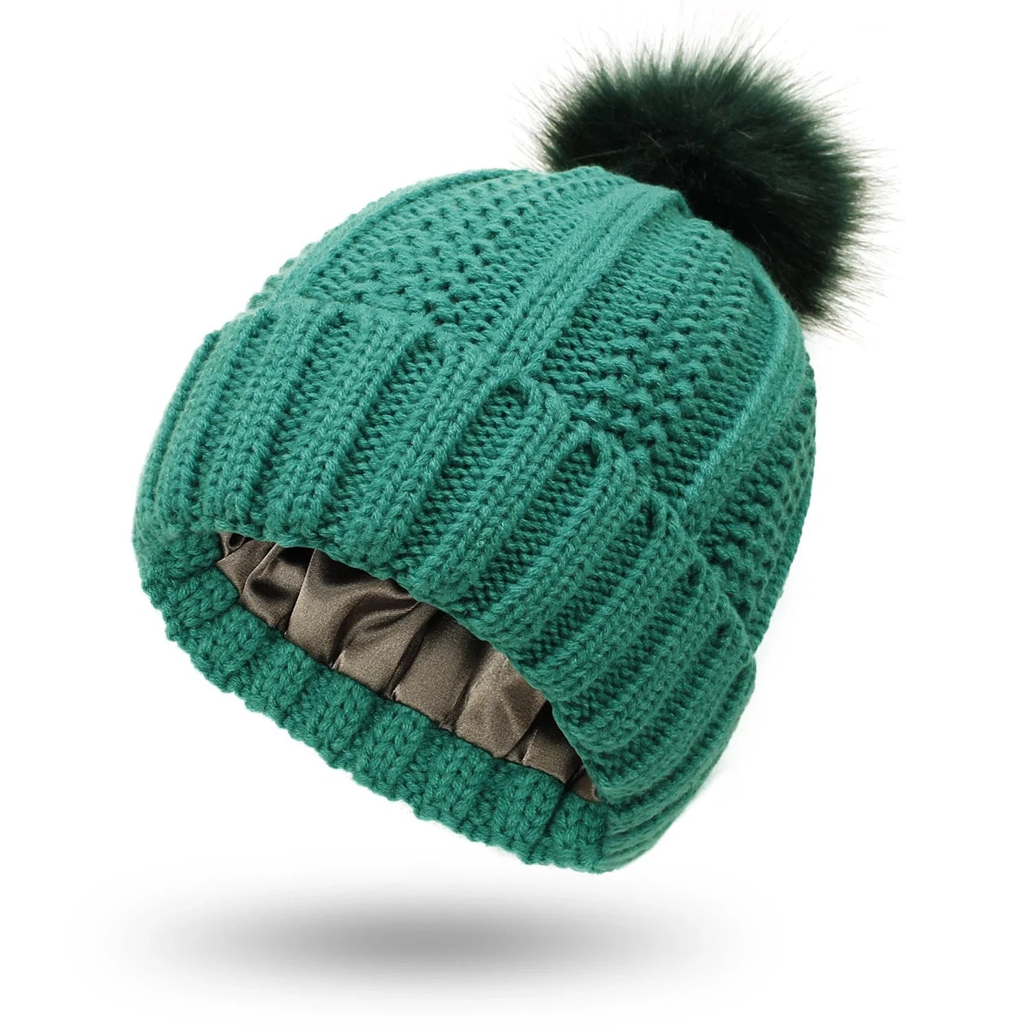 Cozy knit beanies with satin lining, paisley pattern, and faux fur pom poms in a variety of colors