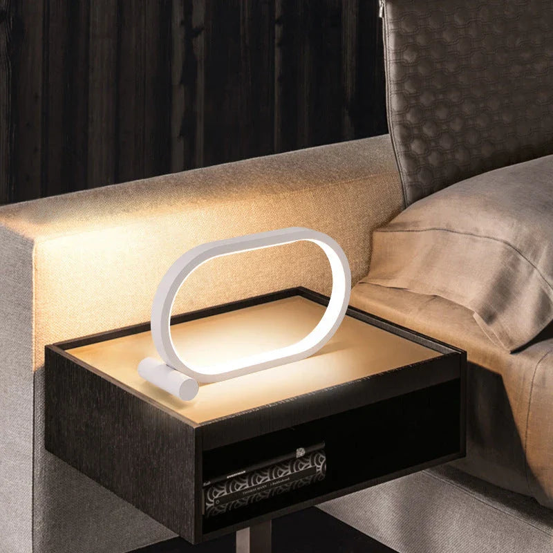 Oval acrylic desk lamp with touch controls, USB charging, and energy-efficient LED lighting