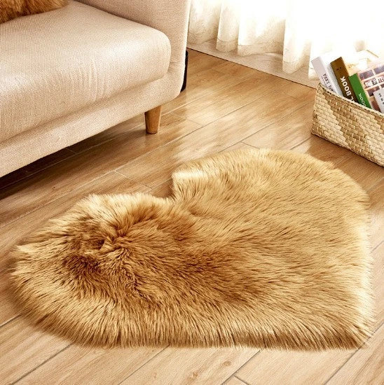 Soft and plush heart-shaped rug in various colors, perfect for cozy home decor