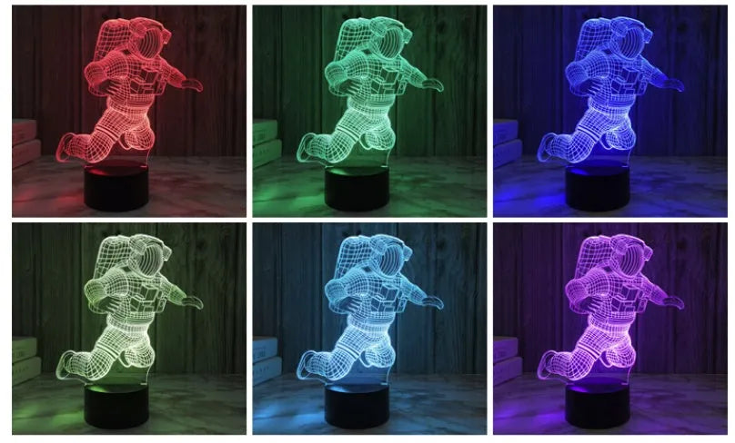 Astronaut 3D small night light with LED glowing on bedside table USB plug-in
