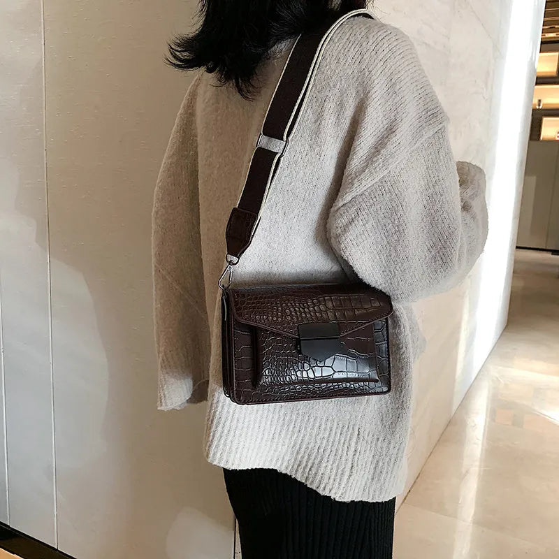Vintage style crossbody bag in PU material showing dimensions of 20cm wide by 14cm high