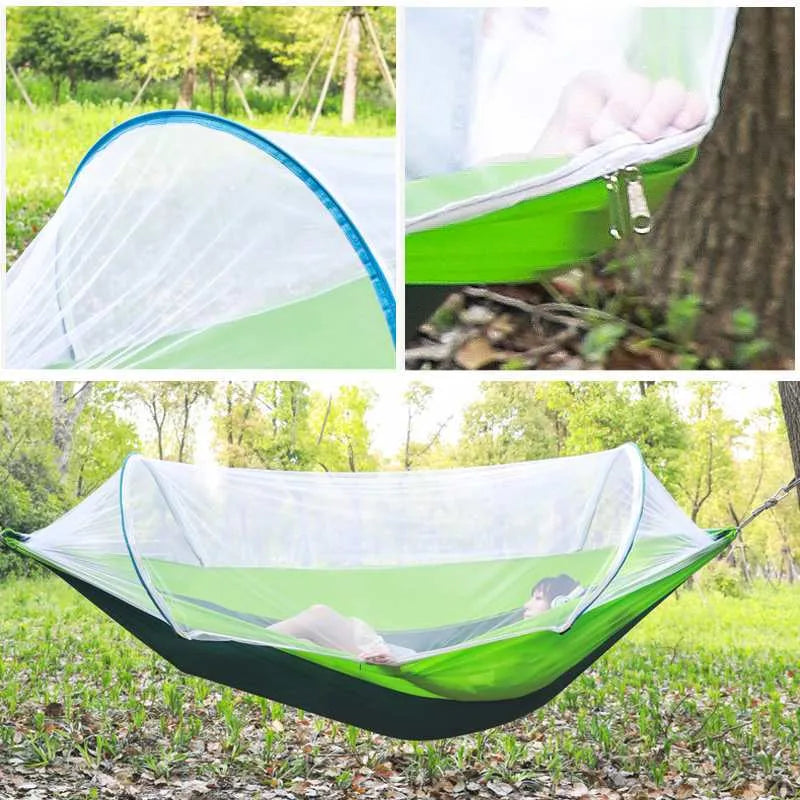 Double hammock bed 260x150cm in Army Green with mosquito-blocking mesh on a camping site