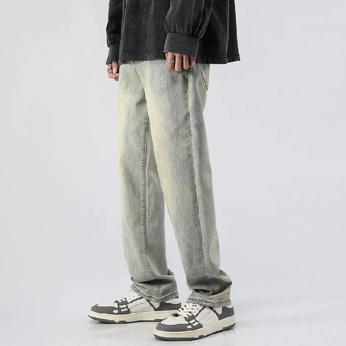 Men's washed distressed slim straight cotton tapered pants in Cement Yellow