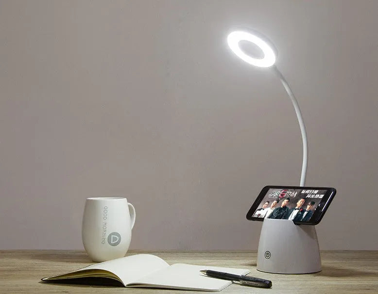 LED folding eye protection table lamp in beige, white, or three colour, with aluminium and ABS body, 8W output, and rechargeable battery
