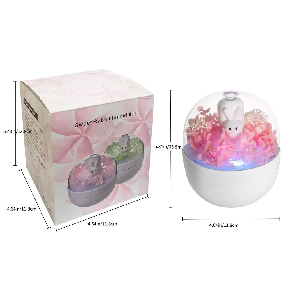 Pink creative rabbit-shaped aromatherapy humidifier with preserved flowers on top.
