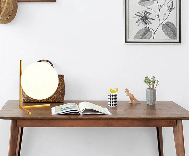 Creative modern floor lamp with glass shade in a living room setting