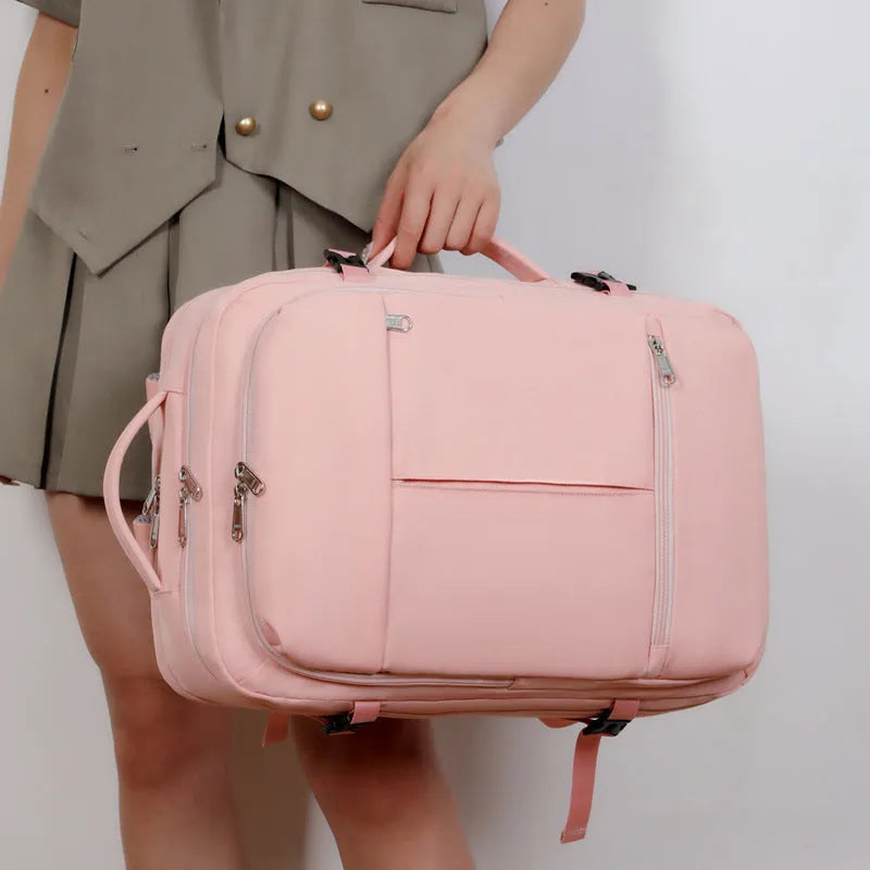 Large waterproof Oxford cloth backpack in a choice of colours, shown with multiple zippered pockets and a 15.6-inch laptop.
