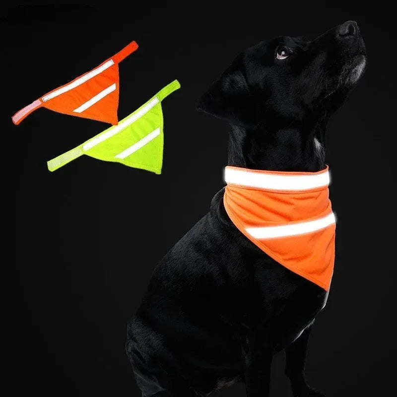 Orange and yellow reflective dog bandana with adhesive strap for night walk safety in three sizes