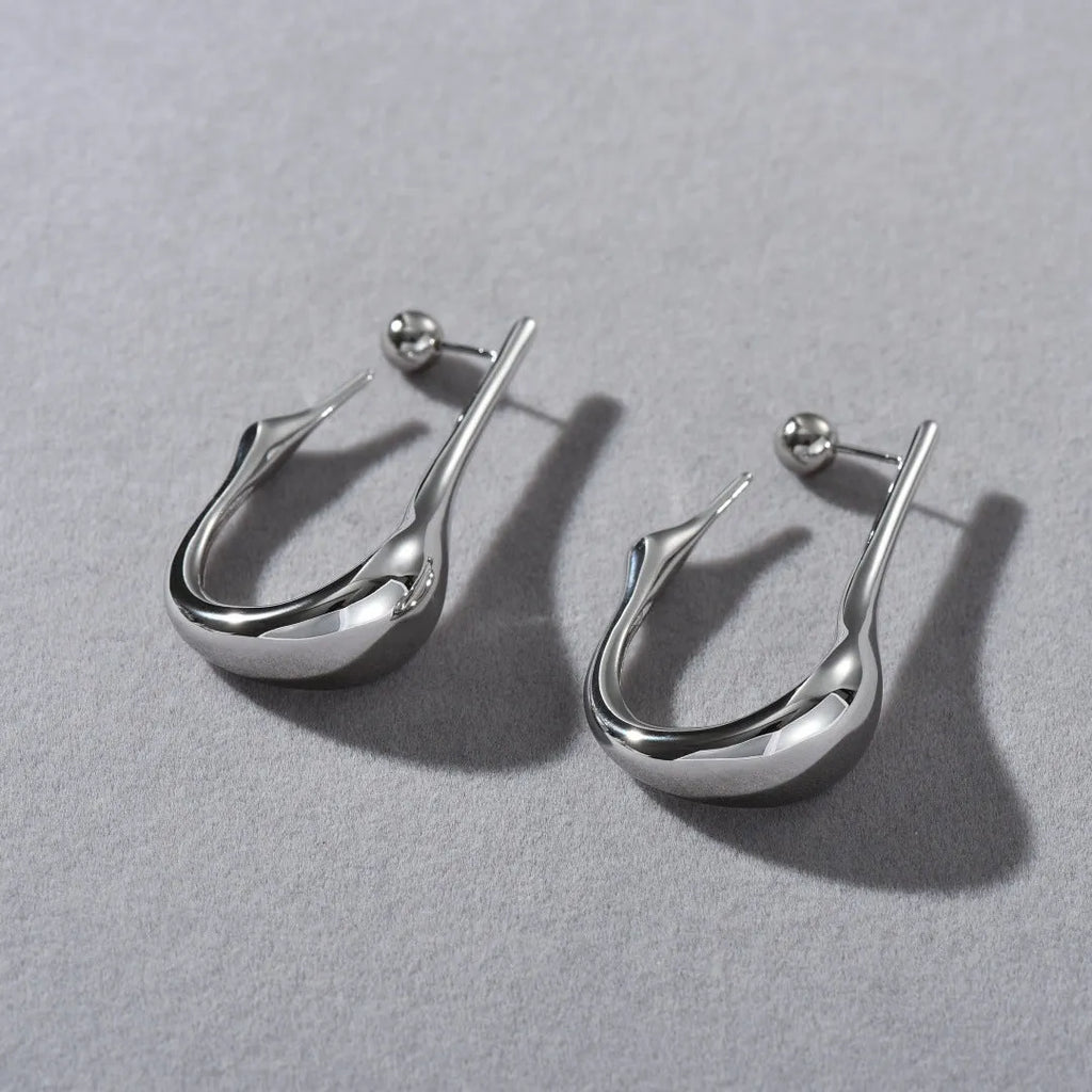 Copper plating 18K real gold irregular lines geometric needle ear studs on white background