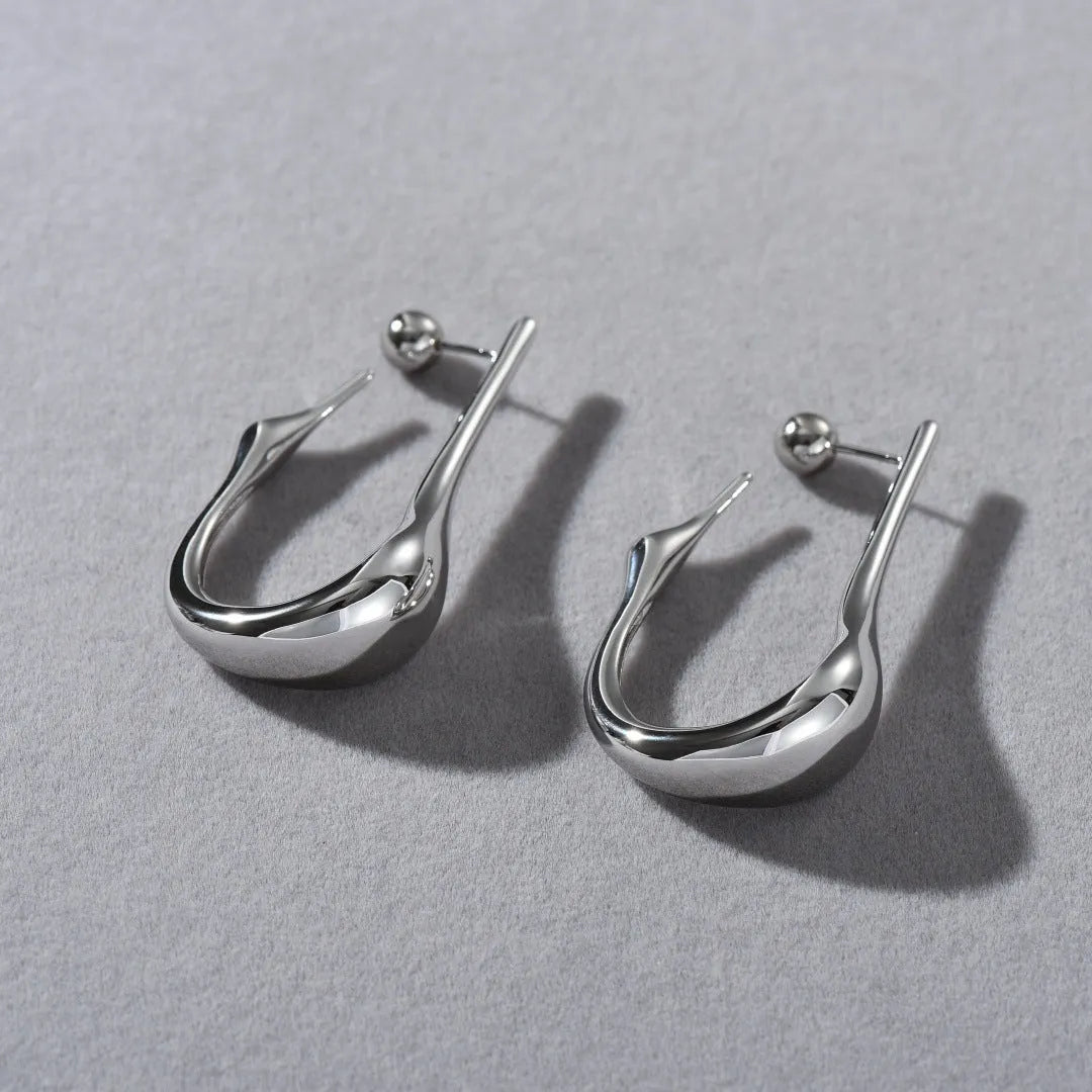 Copper plating 18K real gold irregular lines geometric needle ear studs on white background