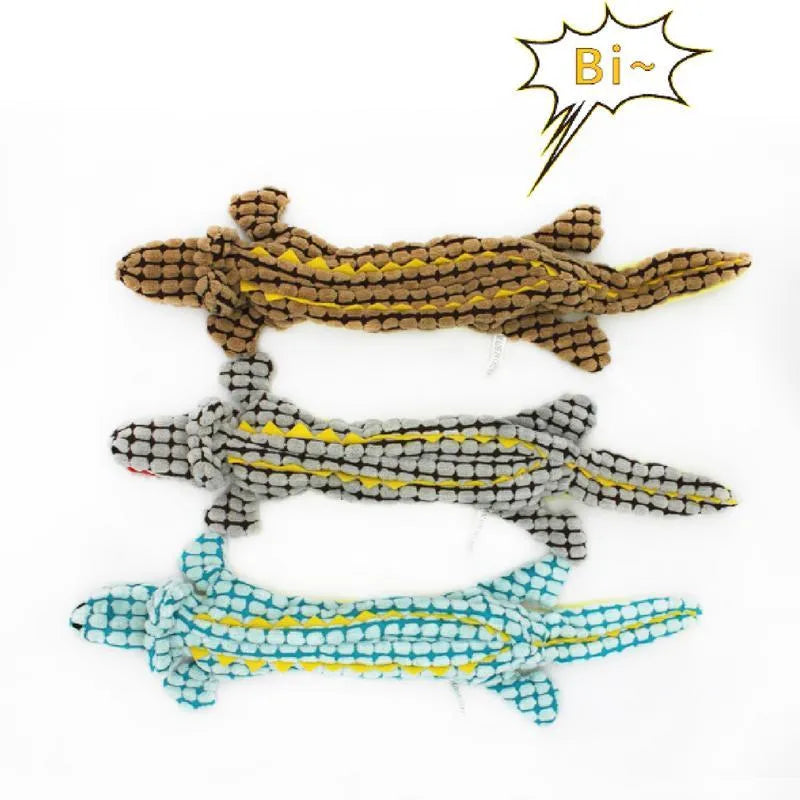 Blue plush crocodile dog toy with corduroy fabric texture and squeaker for interactive play