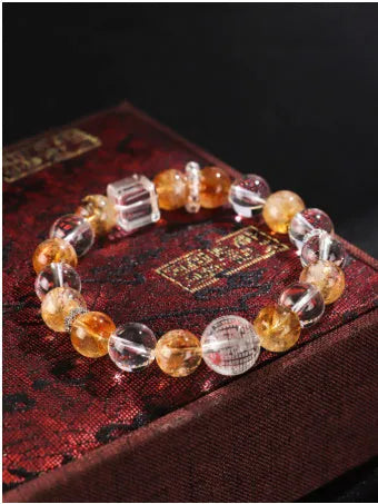 Handmade women's bracelet featuring freshwater pearls combined with citrine crystals