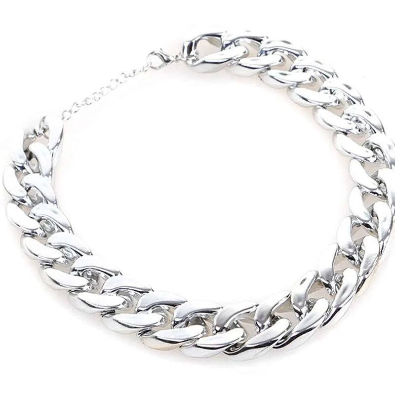 Geometric twisted chain dog collar with buckle on a white background, shown in gold colour options.