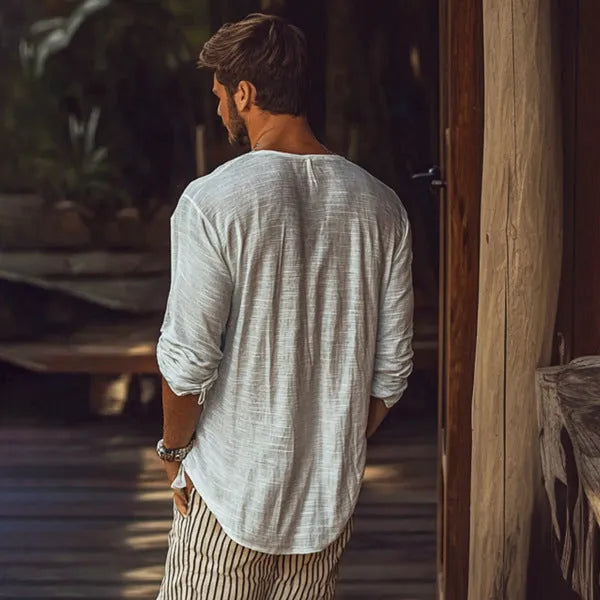 Beige V-neck long-sleeved slim fit t-shirt on a hanger