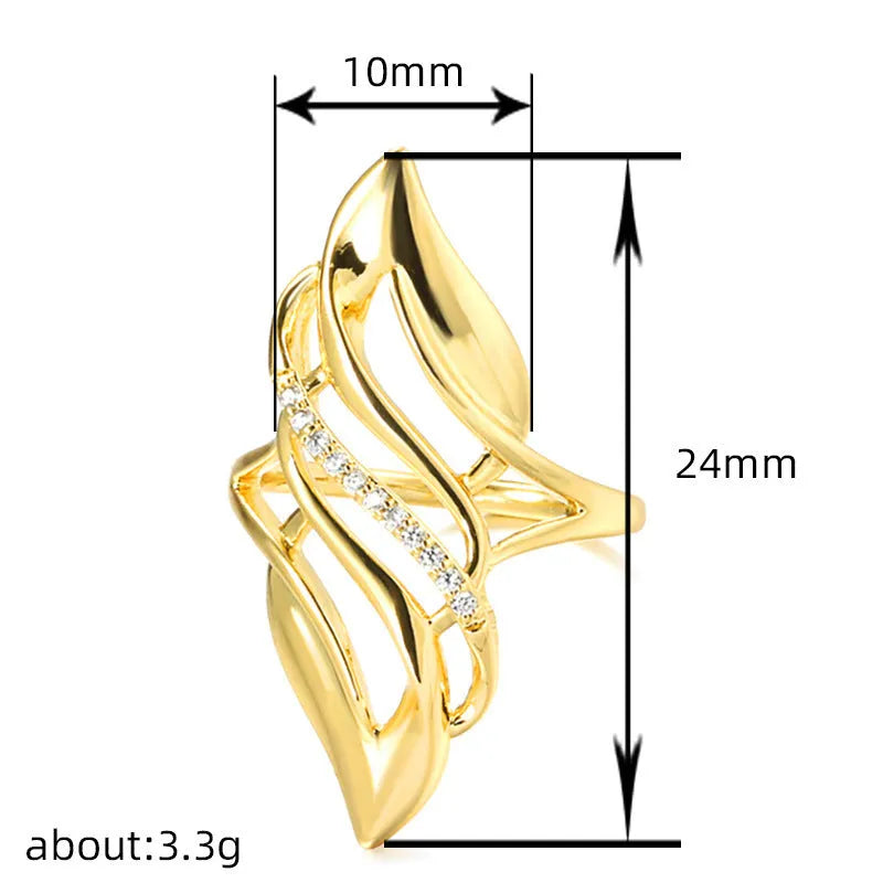 Gold coloured women's ring with exaggerated curved design on copper band