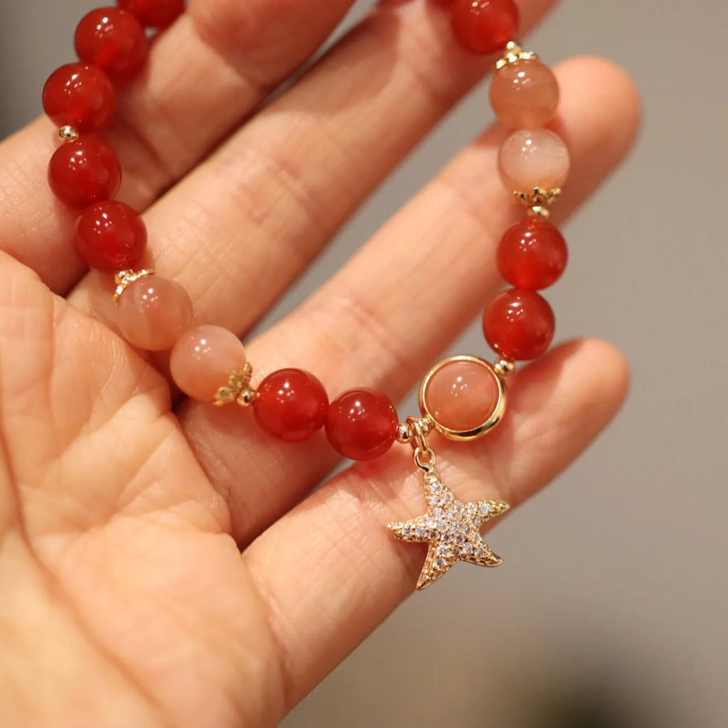 Handmade red agate and Sunstone bracelet with 8mm beads, star design, and ethnic Xiangyun patterning