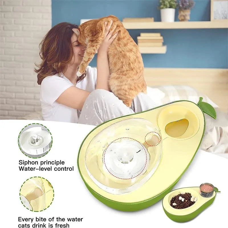 Green avocado-shaped pet feeder with automatic water bottle and separate food bowl