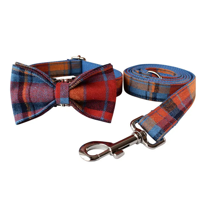 Blue plaid velvet dog collar with metal buckle and bow accessory