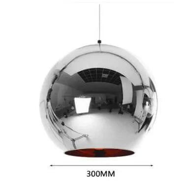 Round glass chandelier with an iron body in gold finish, hanging on an adjustable cord with LED light.