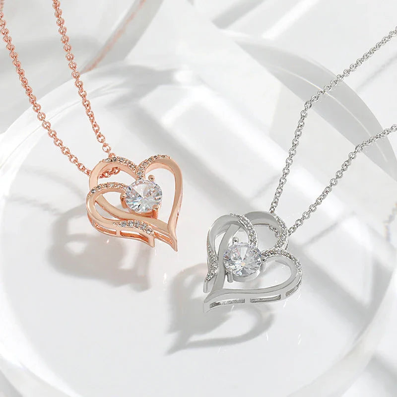 Personalized heart-shaped necklace with sparkling rhinestones, available in white gold or rose gold finishes