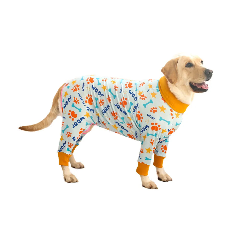 Cotton dog jumpsuit with cartoon print on small dog showing full-body coverage