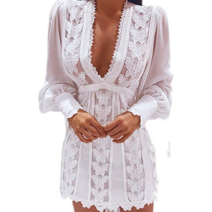 Elegant white lace dress with puff sleeves and a butterfly design, perfect for special occasions and everyday wear.