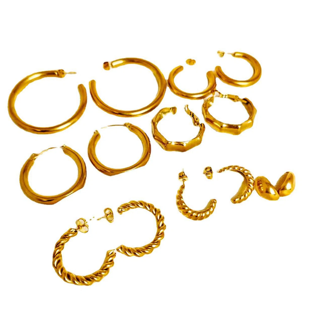 Women's stainless steel irregular twisted asymmetric earrings in gold finish