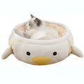 Green chick and dinosaur shaped plush cat bed shown both lying flat and hanging as a hammock.
