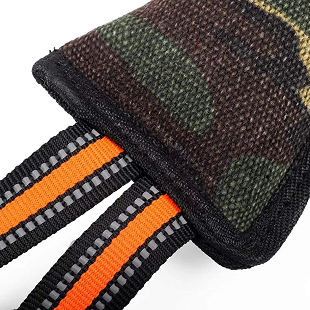 Long jute dog bite stick with reflective yellow edges on a grey background.