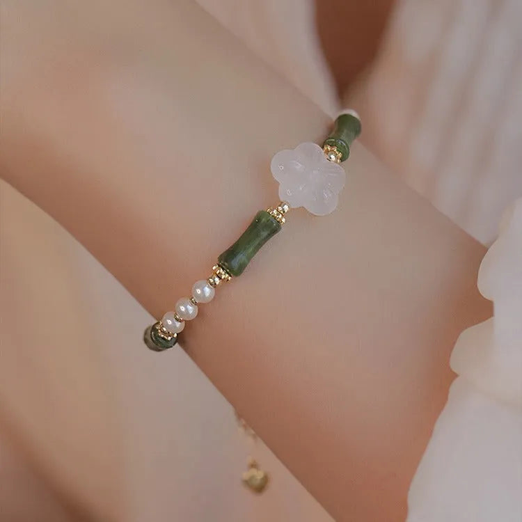 Chinese style olivine bamboo joint bracelet with Hetian jade and copper shell pearls on wrist