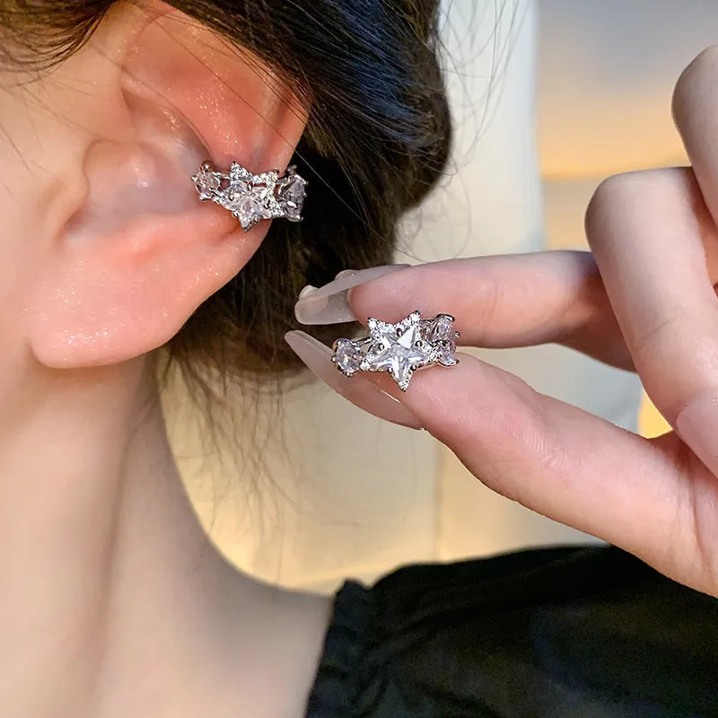 Women's silver electroplated copper star earrings with geometric five-pointed star design