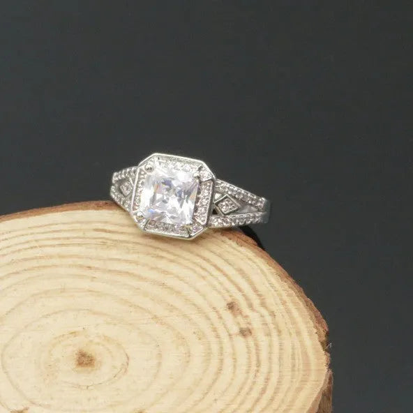 Geometric hollow zircon ring in platinum colour with quadrilateral design on copper band