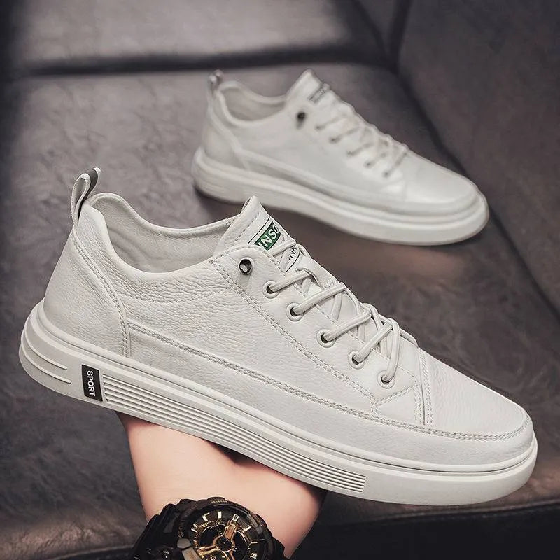 Men's white casual shoes with PU leather upper, round toe, and flat bottom low heel design
