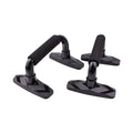 Two I-shaped black push up bars with PP sponge grips on a fitness mat.