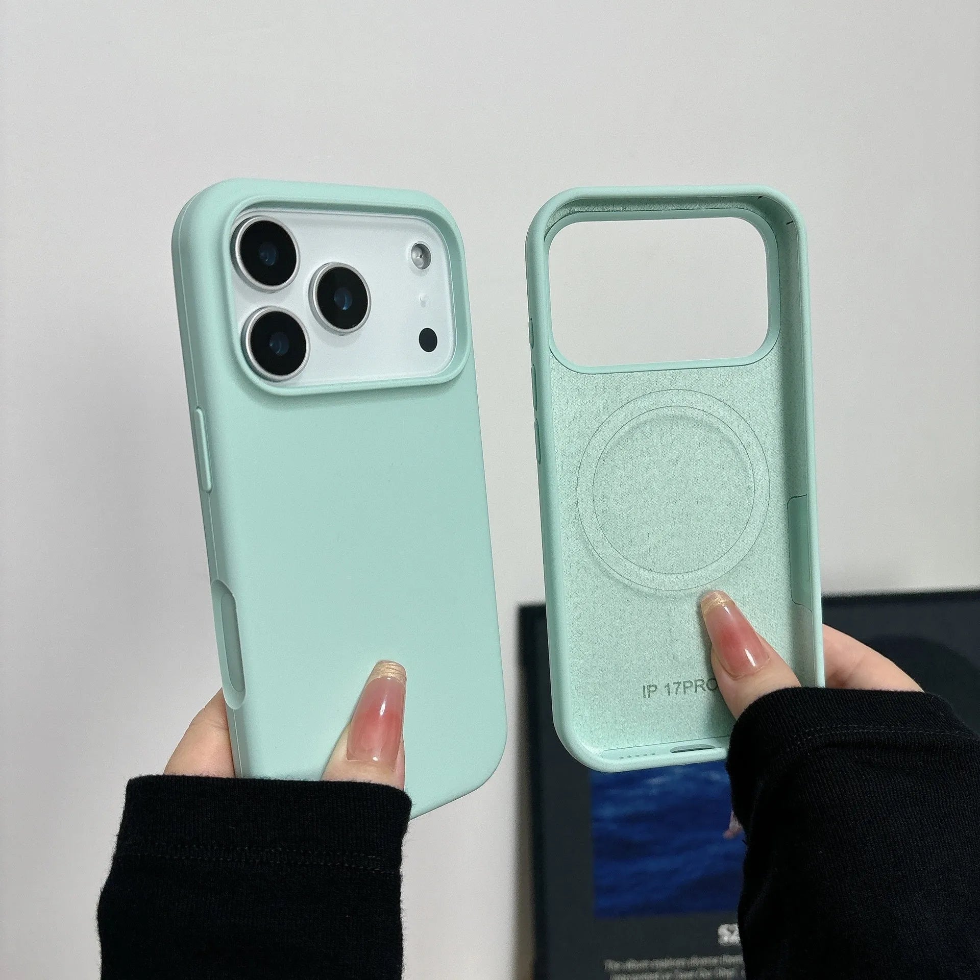 Liquid silicone magnetic charging phone case for iPhone with a dedicated AI button, shown in antique white colour.