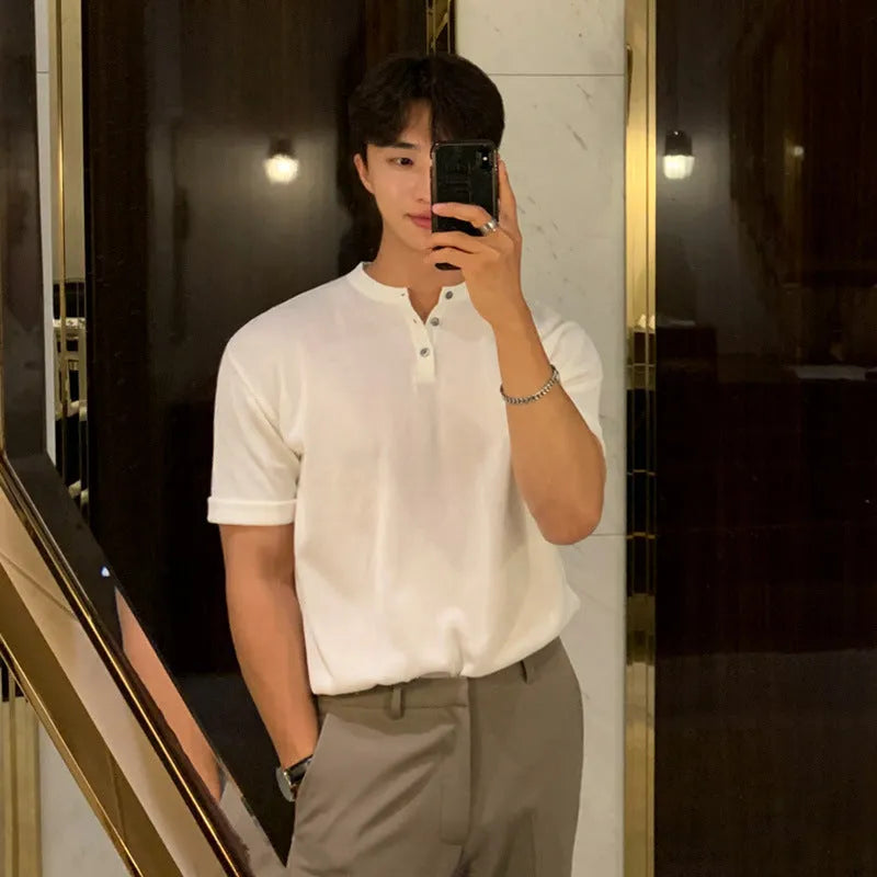 Men's black slim-fit short-sleeved knitted pullover shirt on a hanger