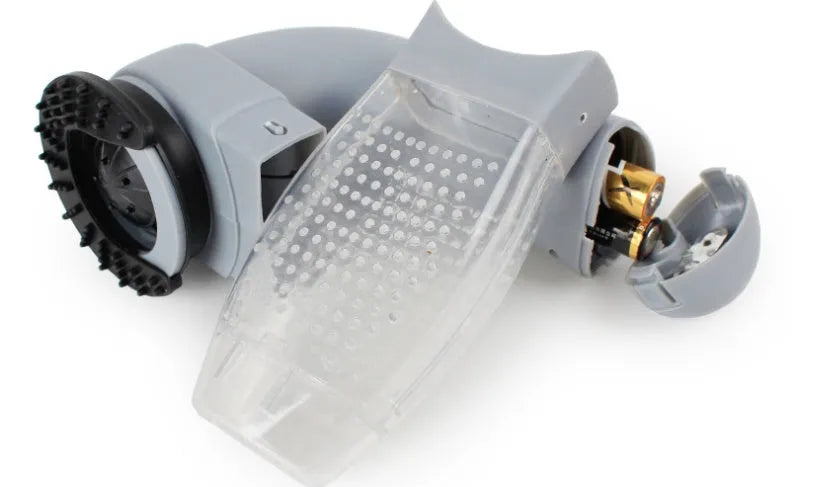 Grey electric pet hair vacuum grooming brush with rubber head and collection canister