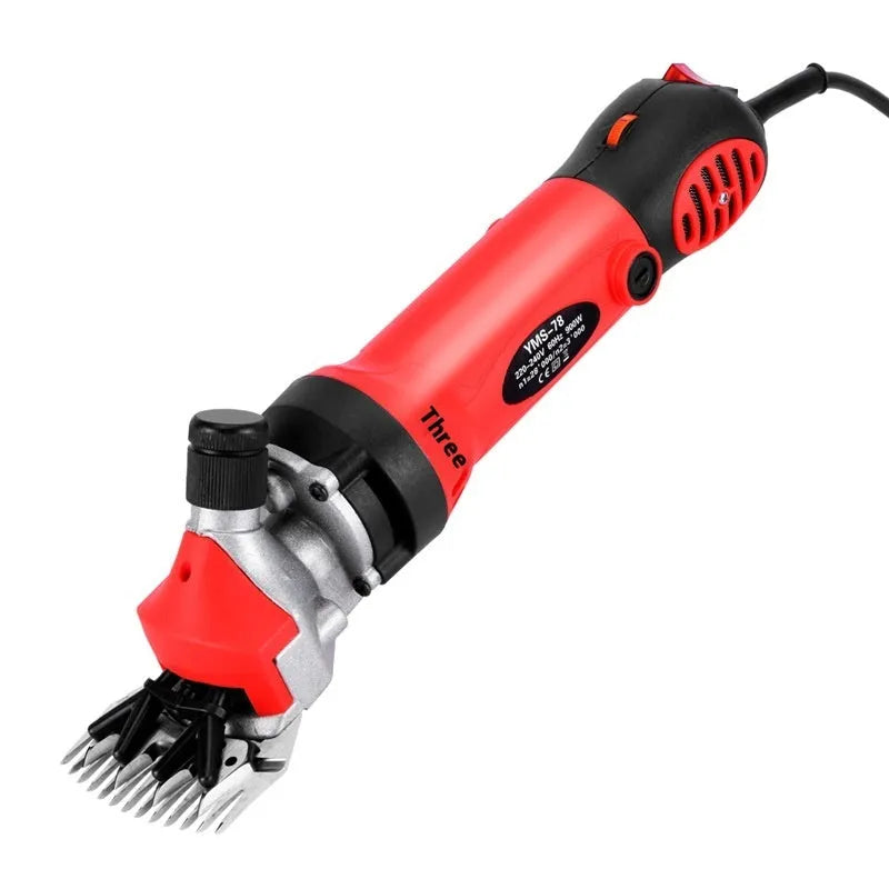Yellow electric wool shearing clippers with 110V cable, multiple blade sets, and tools in a plastic storage box.