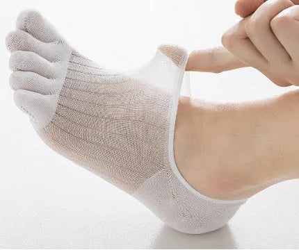 Modal cotton five-finger boat socks in black, shown as a pair laid flat to detail the individual toe design.