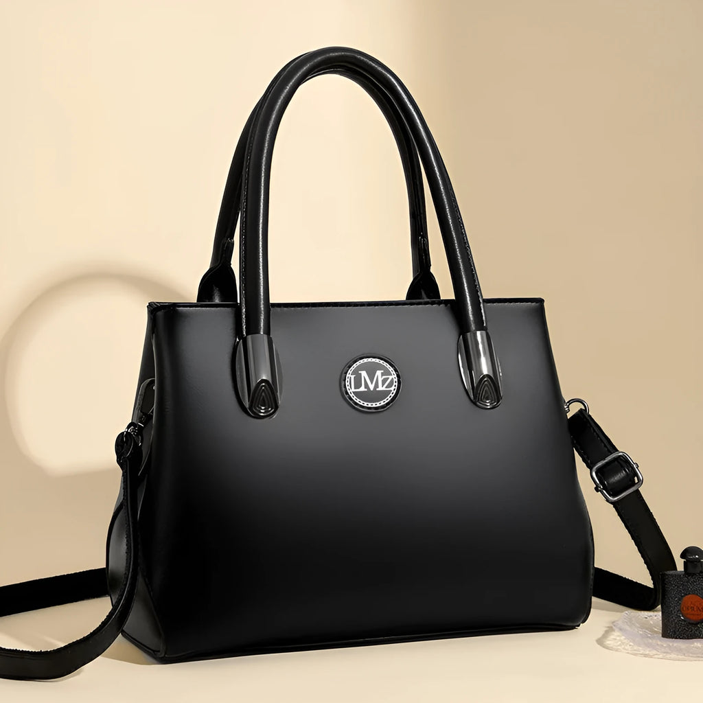 PU crossbody handbag with single strap, zipper compartments, and three-dimensional pocket in black, khaki, brown, green, or blue.