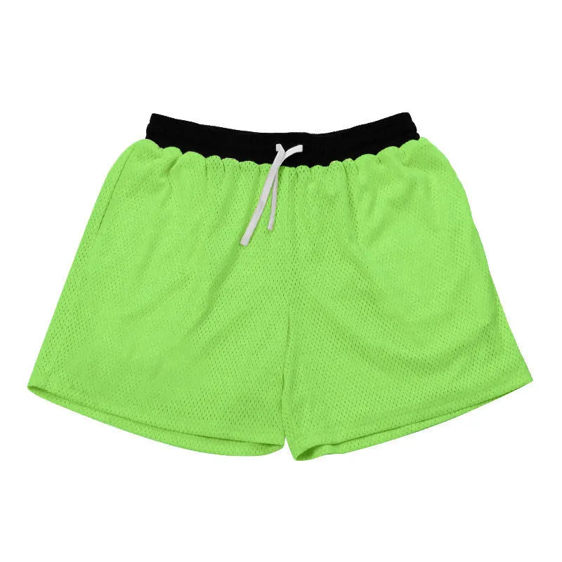 Men's solid colour quick-drying mesh running shorts in black, red, green, purple, or blue