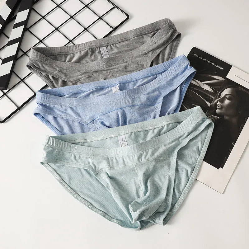 Women's low waist briefs in modal ice silk fabric, showing colour options and knit weave detail.